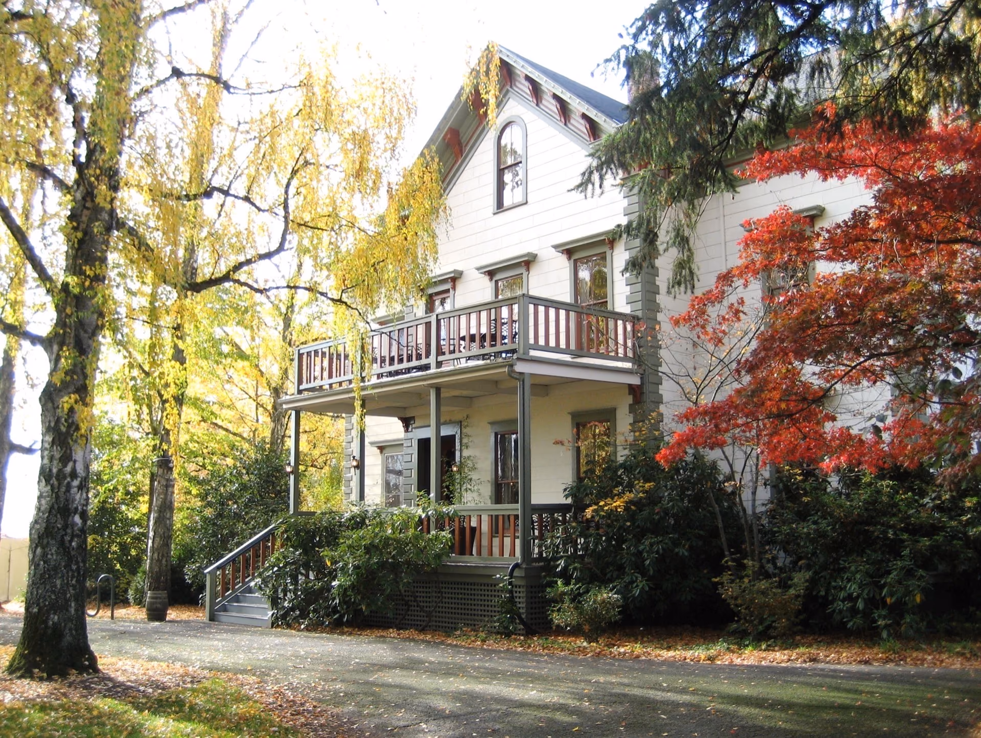 Historic Victorian style house among autumn trees in Hillsboro Oregon