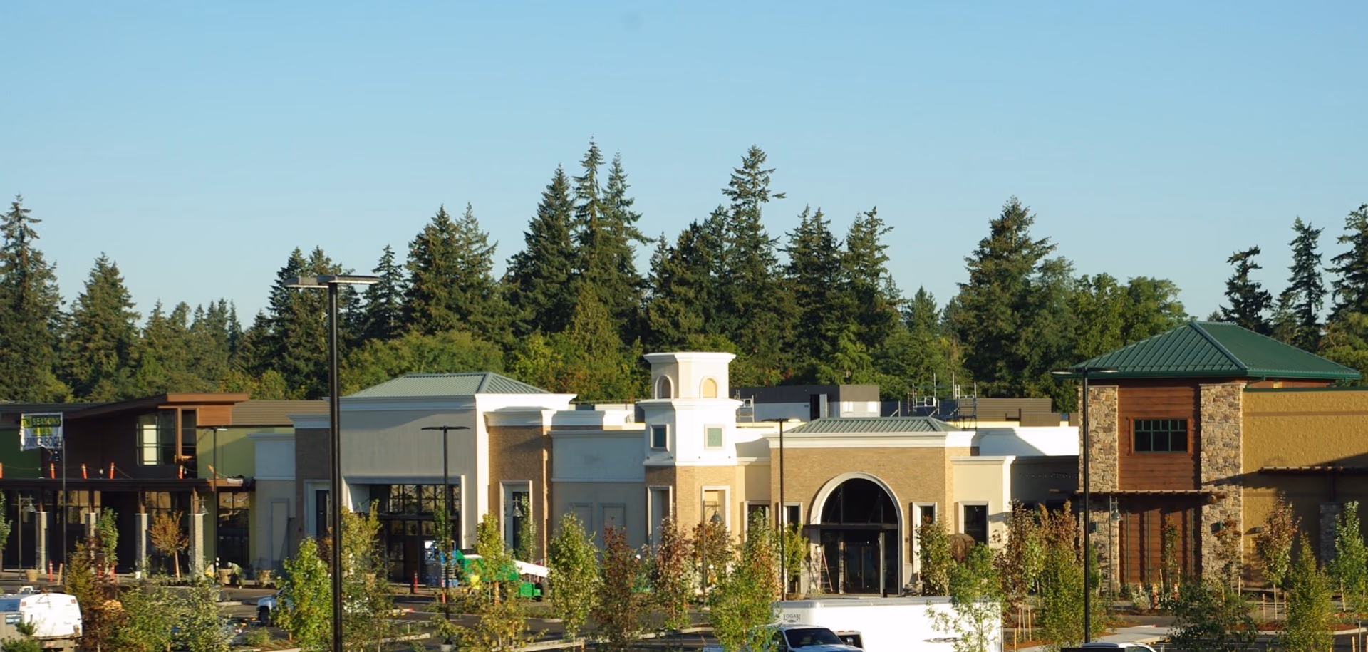 Shopping center and evergreen tree line in Tualatin Oregon